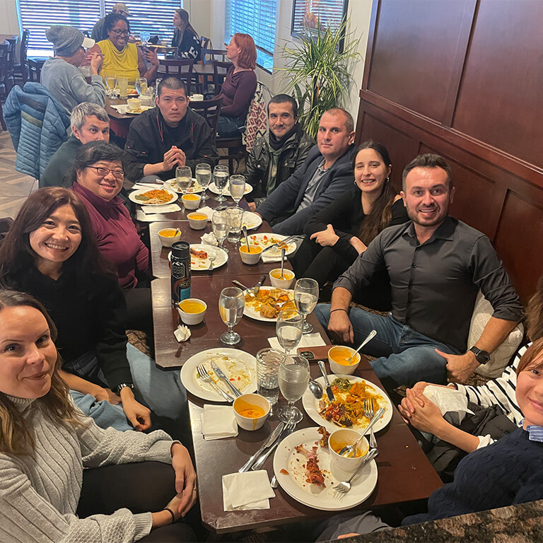 CEUS staff and faculty gathering with students for lunch.